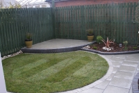 corner patio with shade sail