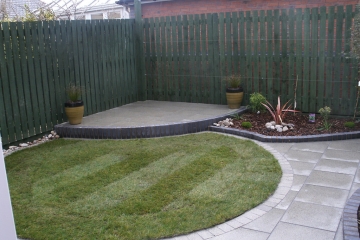 corner patio with shade sail